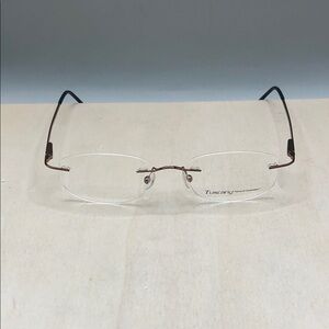 Tuscany  SLE Eyeglasses Rimless Sleek  50-19-145 Unisex Brown Lightweight Slim